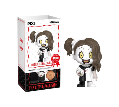PIX! The Little Pale Girl vinyl figure in a black-and-white dress holding a small clown head, beside her box with the white sleeve slid partway off.