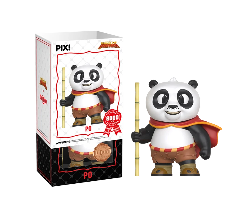PIX! Po vinyl figure in a red cape holding a bamboo staff, beside its box with the white sleeve slid up over the black inner box.