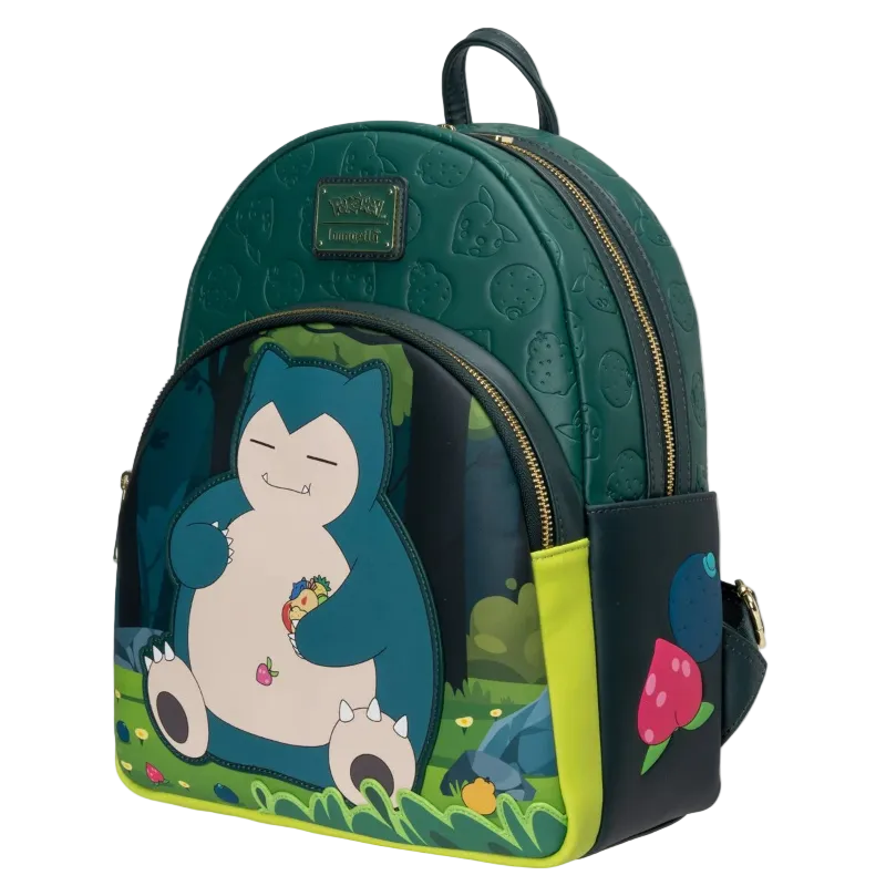 A Loungefly Capsule x Pokemon Snivy backpack in dark green, featuring a large graphic of Snivy on the front pocket, a small grey Pokemon on its belly, and a pink berry on the side pocket.