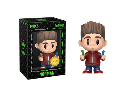 PIX! Norman chase figure in a red jacket holding small green and blue figurines, shown beside its black window box with the figure inside.