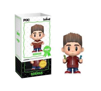 PIX! Norman chase figure holding a small green figurine and a small blue figurine, shown beside its box with the white outer sleeve partly lifted.