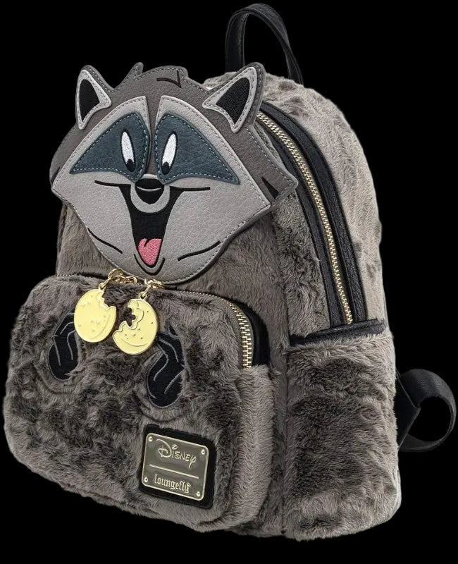 Gray furry backpack with cartoon raccoon face and gold tags on a white background