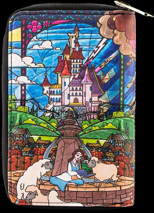 A zip-around wallet featuring a colorful stained-glass style illustration of a fairytale castle, a woman and a man by a fountain, sheep, and a bridge, shown on a plain white background.