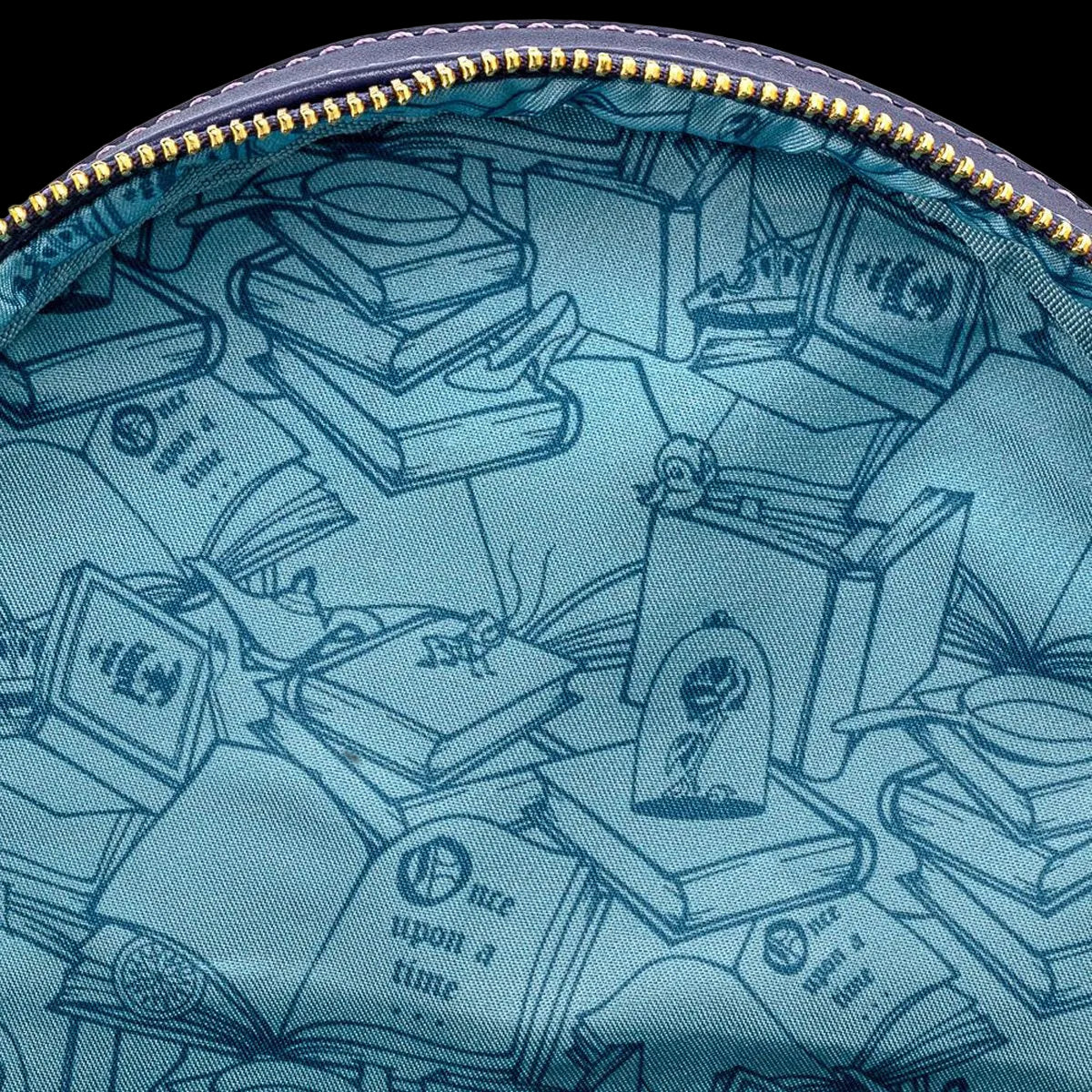 Close-up of a blue pouch with fairy tale book design