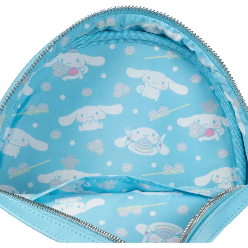 Light blue backpack with white cartoon dog pattern