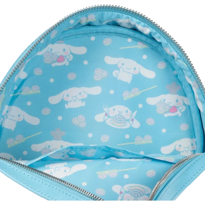 Light blue backpack with white cartoon dog pattern