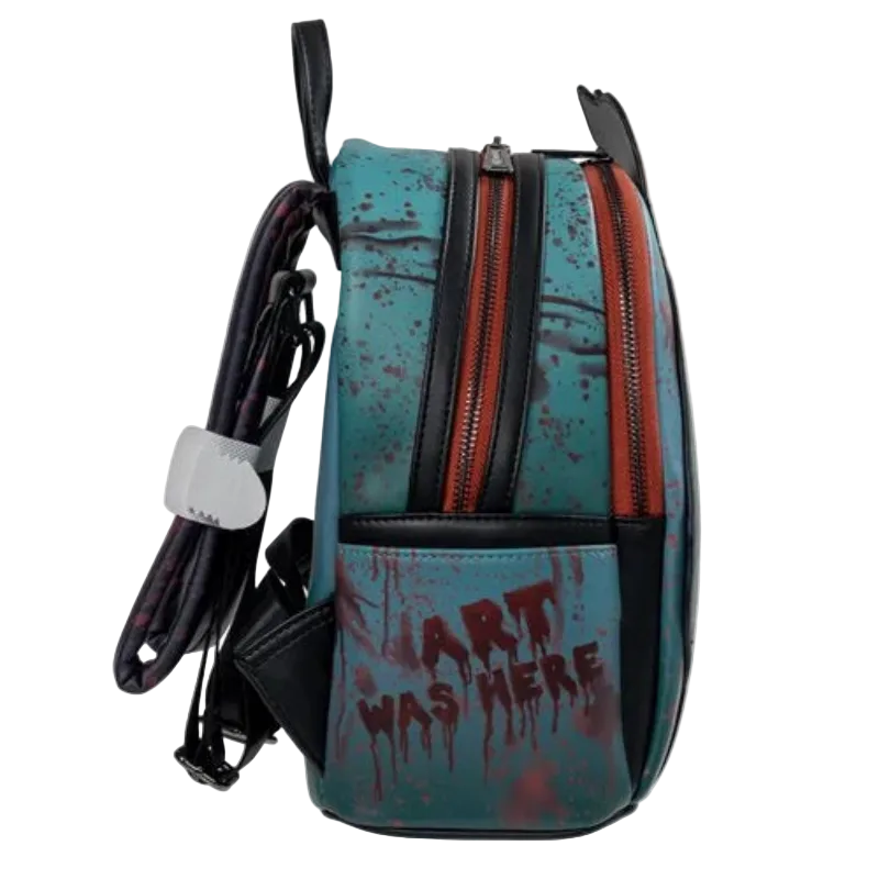 Backpack with blue and black design and text 'ART WAS HERE' on a white background