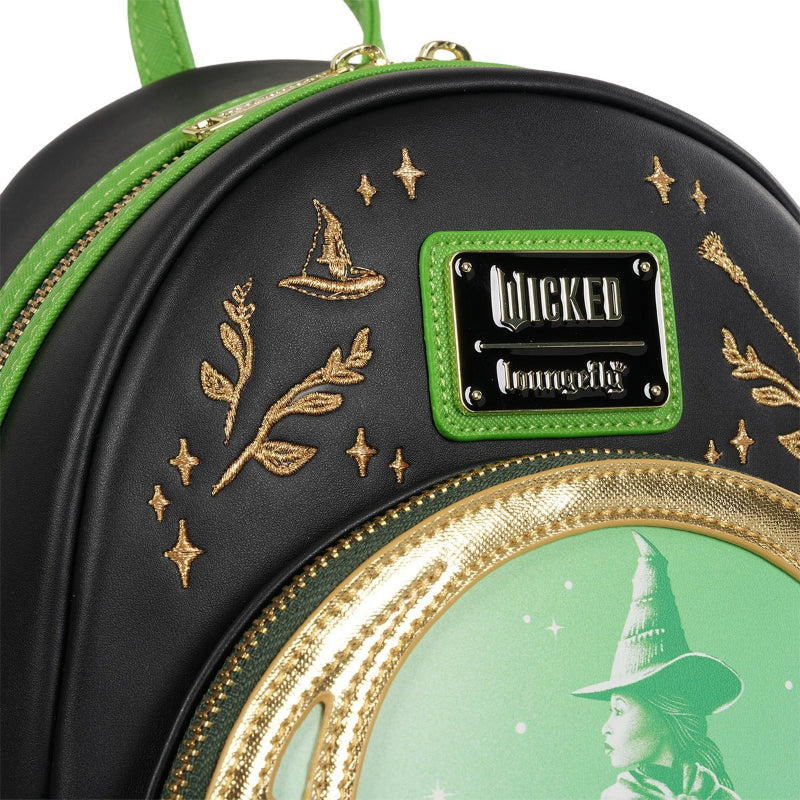 Black round bag with green and gold accents featuring a witch design and 'Wicked' branding.