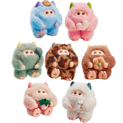 Set of colorful plush toys with animal-like designs on a white background