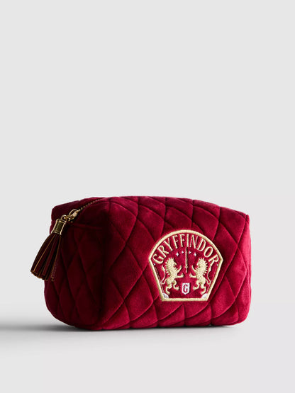 A Harry Potter™ makeup bag with a Gryffindor house emblem design