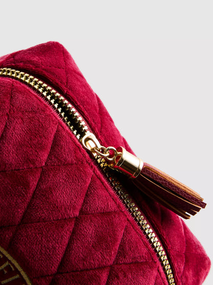 A Harry Potter™ makeup bag with a Gryffindor house emblem design