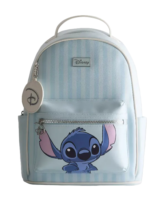 A Disney backpack featuring a light blue and white vertical stripe pattern, with a large graphic of Stitch on the front pocket. The backpack has a top handle, a front zippered pocket, a silver zipper, and a round Disney keychain charm hanging from the left side.