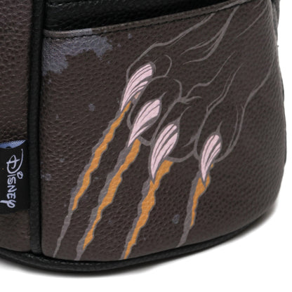 Close-up of a bag with floral design and Disney logo.