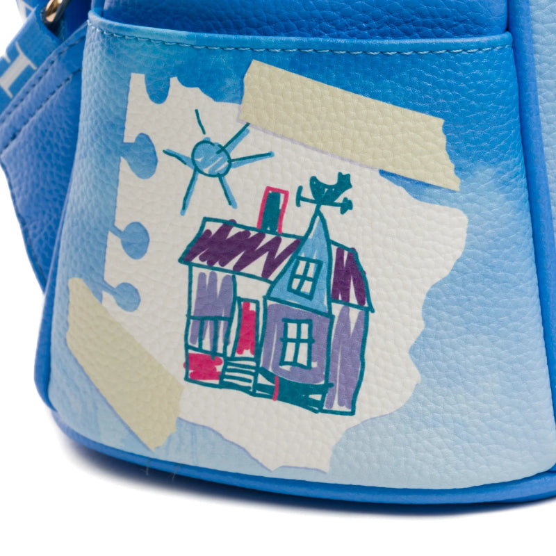 Blue bag with a colorful house design on a white background