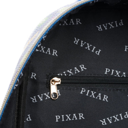 Close-up of a black bag with 'Pixar' logo pattern, featuring a gold zipper.