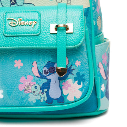 Teal backpack with Disney character design on a white background