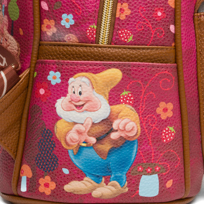 Backpack with animated character design on a pink background