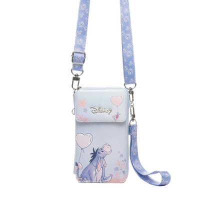 Disney crossbody phone pouch featuring Eeyore, a light blue and lavender color scheme with pink heart accents, and a matching patterned strap on a white background.