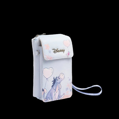 A light blue faux leather wallet featuring a Disney Eeyore balloon print, a silver-tone metal logo on the front flap, and a matching wrist strap, shown against a plain white background.