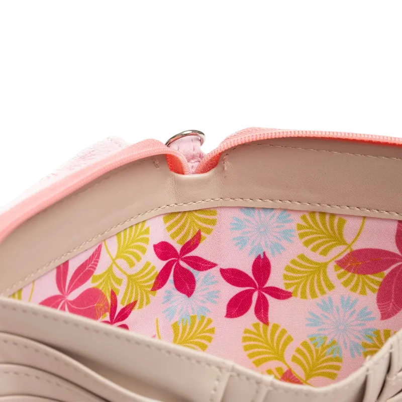Close-up of a beige leather zipper pouch showing a vibrant pink, yellow, and blue floral patterned interior lining.