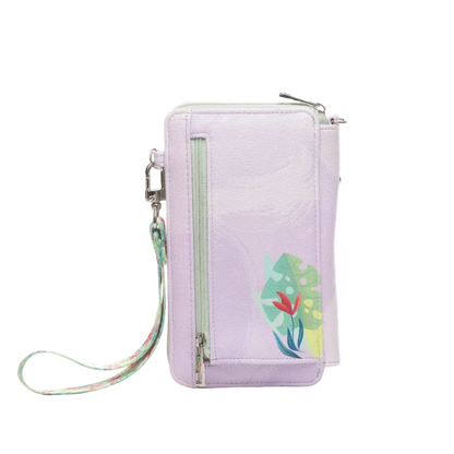 A light purple textured crossbody phone bag with a colorful tropical leaf and flower print on the front, featuring a wrist strap and silver zippers, shown on a white background.