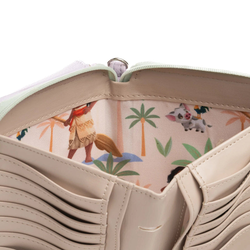 Close-up of a beige leather wallet or card case opened to show a colorful printed interior lining with cartoon characters and palm trees on a white background.