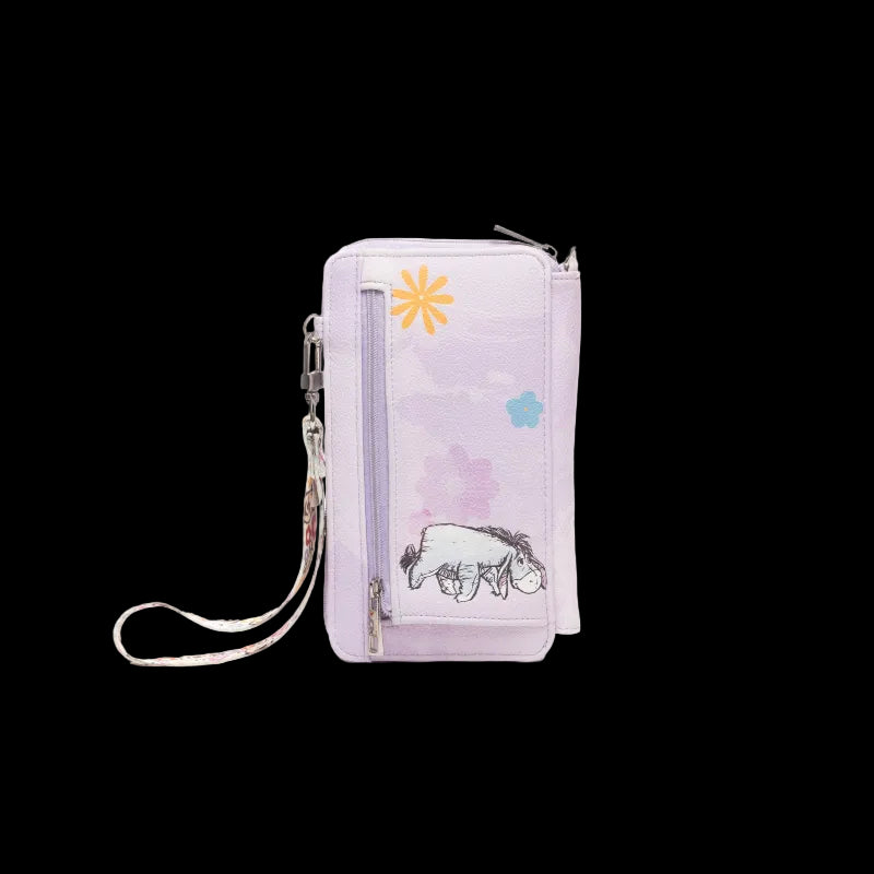 A light purple crossbody phone bag featuring a printed illustration of Eeyore the donkey, a yellow flower, and a blue flower on a white background.