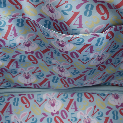 Children's pillowcases with colorful numbers and cartoon characters on a light blue background.