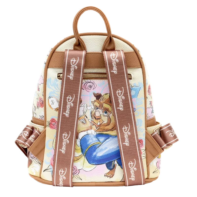 A Disney-themed mini backpack featuring Belle from The Princess and the Frog. The backpack has a cream-colored canvas body with a floral pattern, brown faux-leather trim, and wide brown shoulder straps printed with the Disney logo.