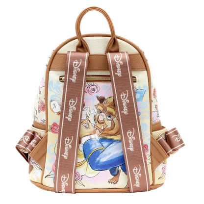 A Disney-themed mini backpack featuring Belle from The Princess and the Frog. The backpack has a cream-colored canvas body with a floral pattern, brown faux-leather trim, and wide brown shoulder straps printed with the Disney logo.