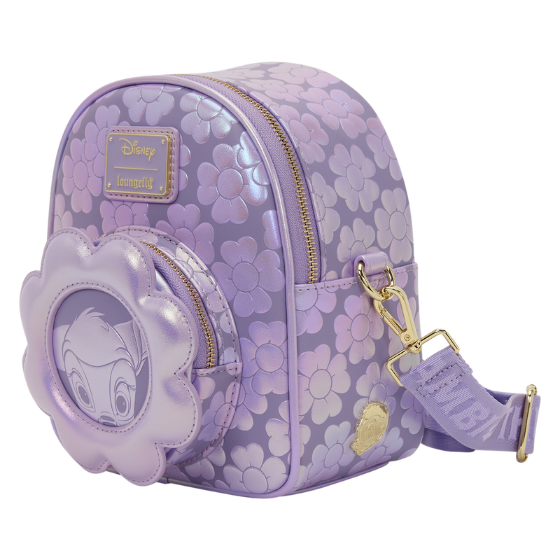 Purple floral-patterned backpack with character face on a clear background
