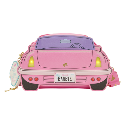 Pink car-shaped purse with 'Barbie' branding on a white background