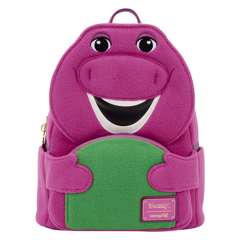 Pink dinosaur-shaped backpack with a green belly on a white background