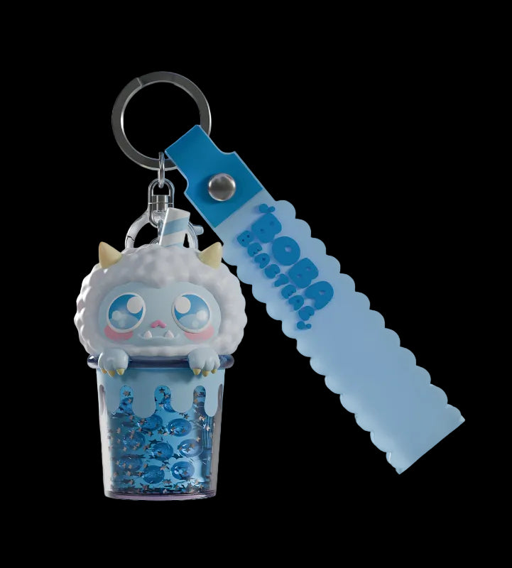 Keychain with a cute character design on a light gray background