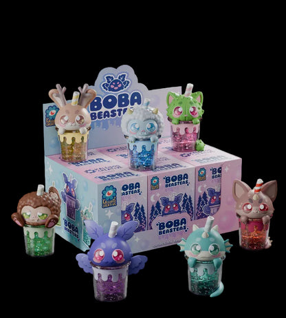 Collection of colorful 'Boba Beasts' toys with packaging on a white background