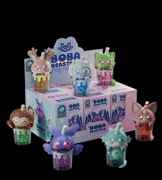 Collection of colorful 'Boba Beasts' toys with packaging on a white background