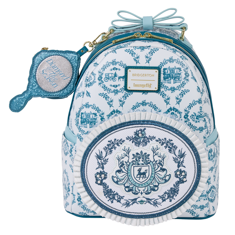 Backpack with decorative blue patterns and a matching hand mirror on a white background