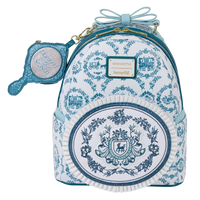 Backpack with decorative blue patterns and a matching hand mirror on a white background