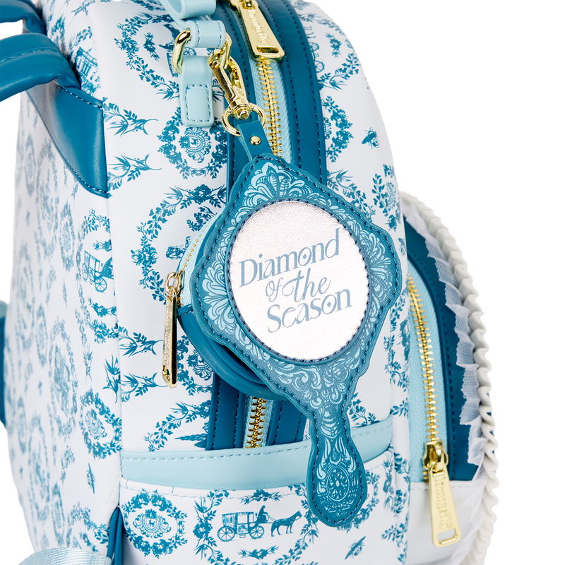 Backpack with decorative pattern and 'Diamond of the Season' accessory on a white background