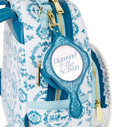 Backpack with decorative pattern and 'Diamond of the Season' accessory on a white background