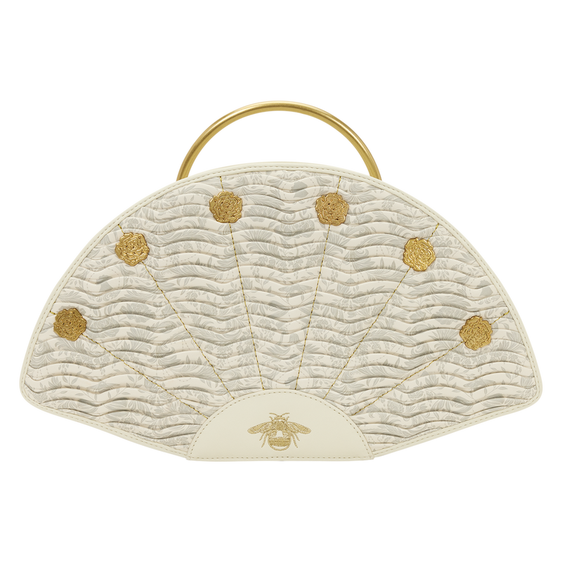 Beige handbag with gold accents and a bee emblem on a white background