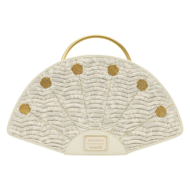 Quilted handbag with gold polka dots and handle on a white background