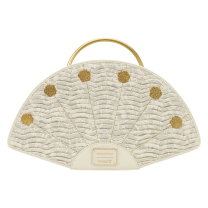 Quilted handbag with gold polka dots and handle on a white background