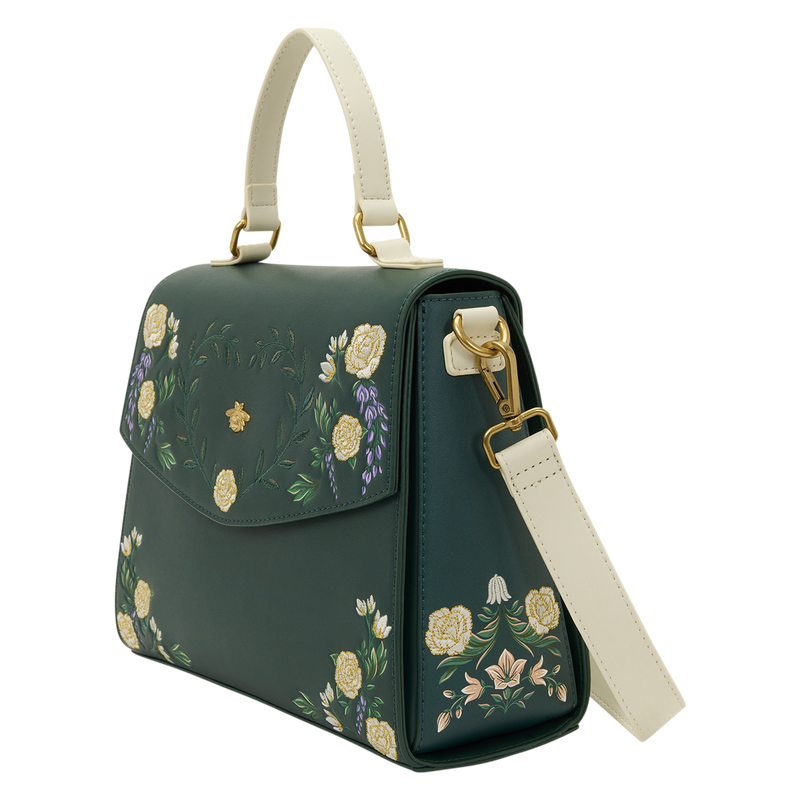 Green handbag with floral embroidery on a white background
