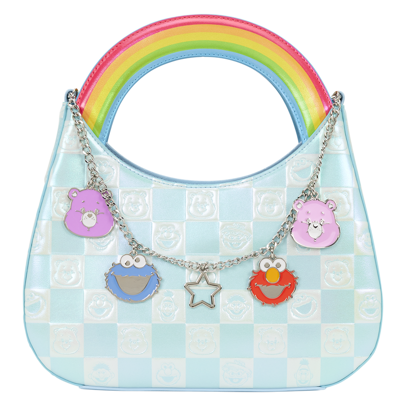 Children's handbag with rainbow handle and character charms on a white background