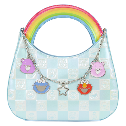 Children's handbag with rainbow handle and character charms on a white background