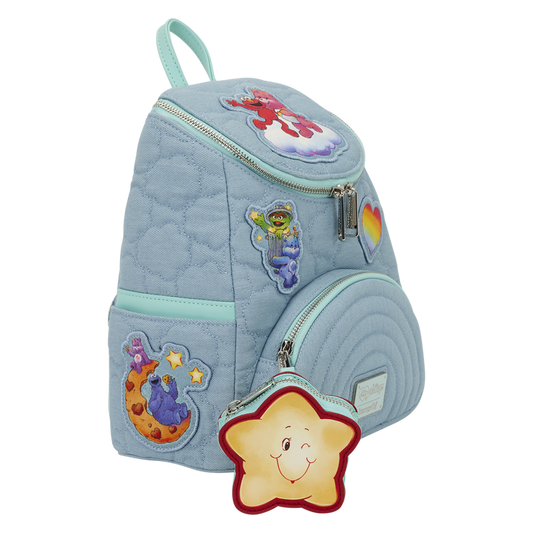 Light blue backpack with cartoon character patches on a white background