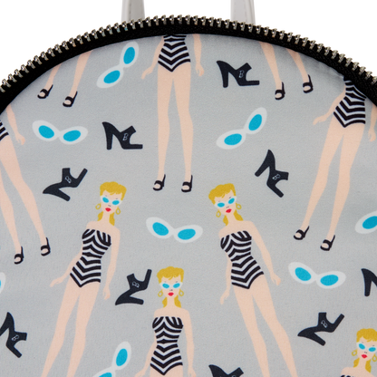 Patterned product with illustrations of women, high heels, and sunglasses on a gray background.