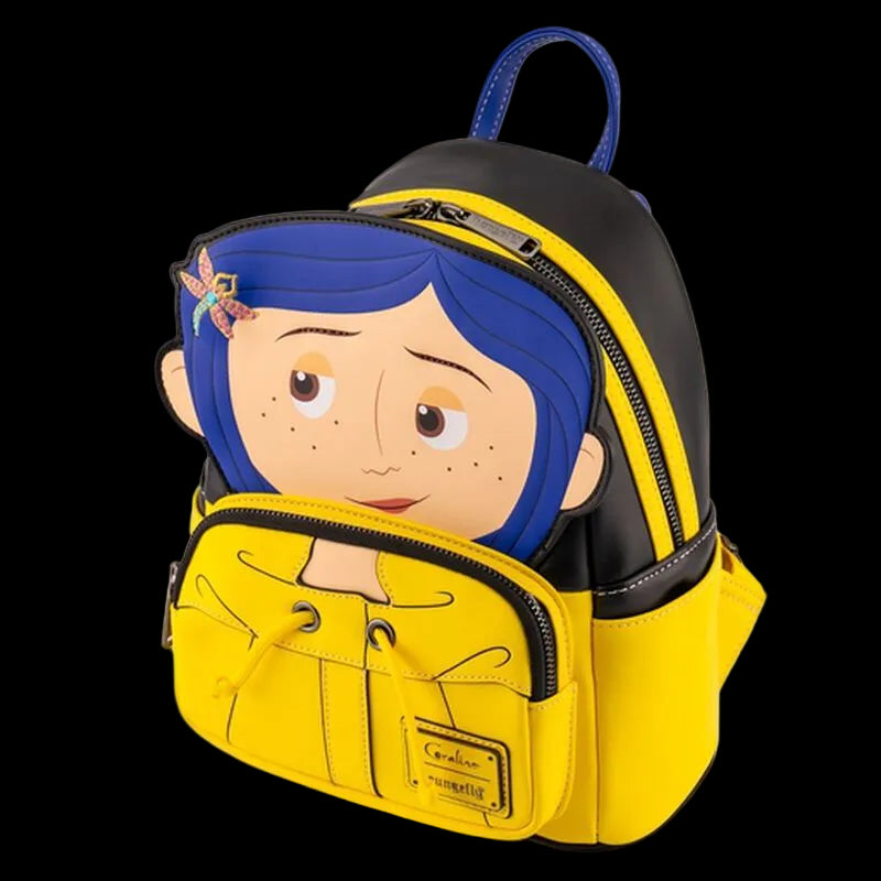 A small backpack featuring a cartoon character design with blue hair and freckles, shown on a plain white background. The backpack is primarily yellow and black with a blue top handle.
