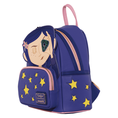 Blue backpack with star patterns and a character design on a white background